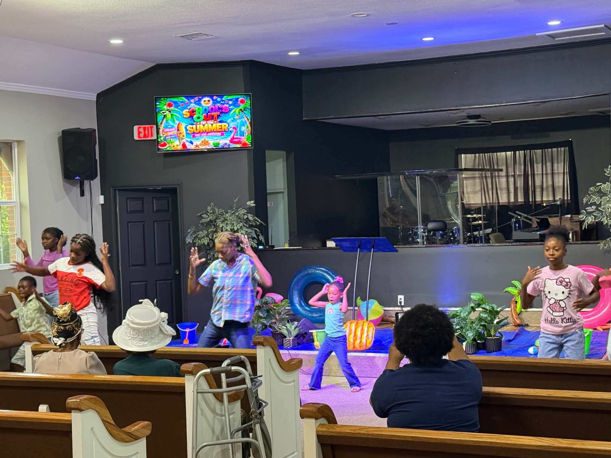 Children worshipping at The Presence House PC